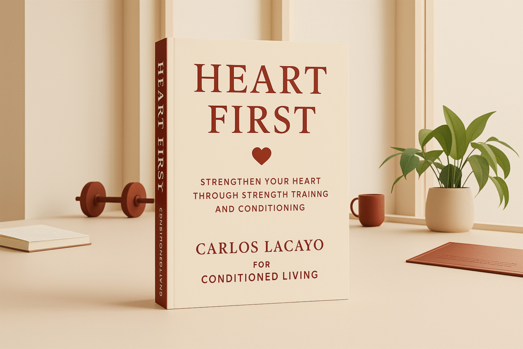 Heart First fitness and wellness guide book cover by Carlos Lacayo, styled on a warm, minimalist workspace with strength training equipment and plants.